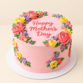 Illustrative pink floral Mother’s Day cake on a light warm cream background